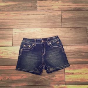 A pair of justice jean shorts
